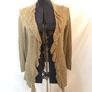 Ruffled sheer throw over jacket